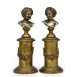 After Franz Xaver Messerschmidt. A pair of Grand Tour style brass miniature busts depicting a