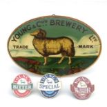 A Young & Co. Brewery Ltd Wandsworth painted oval pub sign depicting a sheep in a landscape, 47cms