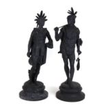 A pair of spelter figures in the form of native South American Indians, approx 65cms high (2).