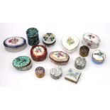 A group of pill and trinket boxes to include Kaiserware, Coalport and enamel examples.