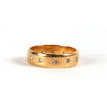 An 18ct gold and diamond ring, weight 4.6g, approx UK size 'N'.