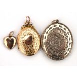 Three gold front and back photograph lockets, one in the form of a heart (3).Condition ReportGood