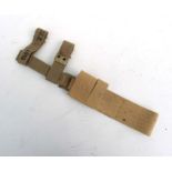 An unissued 08 Pattern bayonet frog with helve strap and carrier. Marked to the reverse of the
