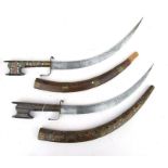 A matching pair of North African hunting daggers with curved blades. Blade length 40cms (15.75ins)