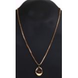 A 9ct gold locket on a 9ct gold chain, weight 12.3g.