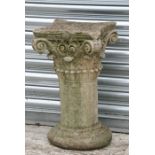 A well weathered constituted stone Corinthian column with capitol, 53cms high.