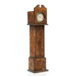 A late 19th century William Whiteley pokerwork pocket watch stand in the form of a longcase clock;