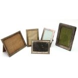 Five silver rectangular strut photo frames, various dates and makers, the largest 16 by 22.5cms (