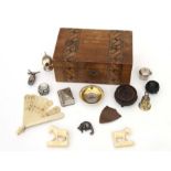 A late Victorian walnut box with parquetry inlay containing various items including a small