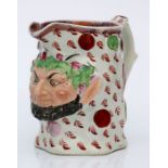 A 19th century Staffordshire pearlware Bacchus jug, 12cms high.