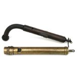 A brass steam engine whistle 'Nightingale M & B No 307258', 36cms long; together with another