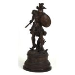 A spelter figure in the form of a Grecian warrior, mounted on a plinth, 54cms high.