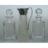 A silver plate mounted cut glass claret jug, 25cms high; together with a Scottish square cut glass