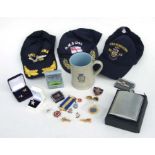 A quantity of Naval items to include baseball caps for USS Missouri and others, lapel and other