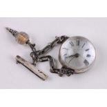 A Victorian style glass ball watch on an Albert chain with key.