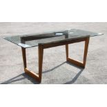 A contemporary modern Silvio Cavatorta Italian inspired glass dining table with rectangular glass