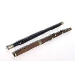 A rosewood flute, 37cms long; together with a similar ebony example, 37cms long (2).