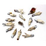 A quantity of Scottish claw and feather brooches.