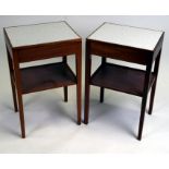 A pair of mid century night stands with a single drawer above an under-tier joined by tapering