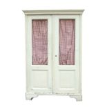 A Victorian style painted larder cupboard with twin mesh grille panelled doors enclosing a shelved