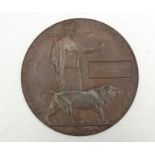 A WWI memorial Death Plaque named 'Joseph Porteous Skinner', 12cms diameter.