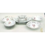 A Victorian continental porcelain part dinner and tea service decorated with sprays of flowers, to