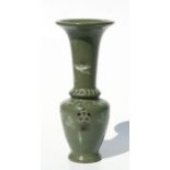 A Korean celadon glaze vase decorated with flowers and birds, 26.5cms high.