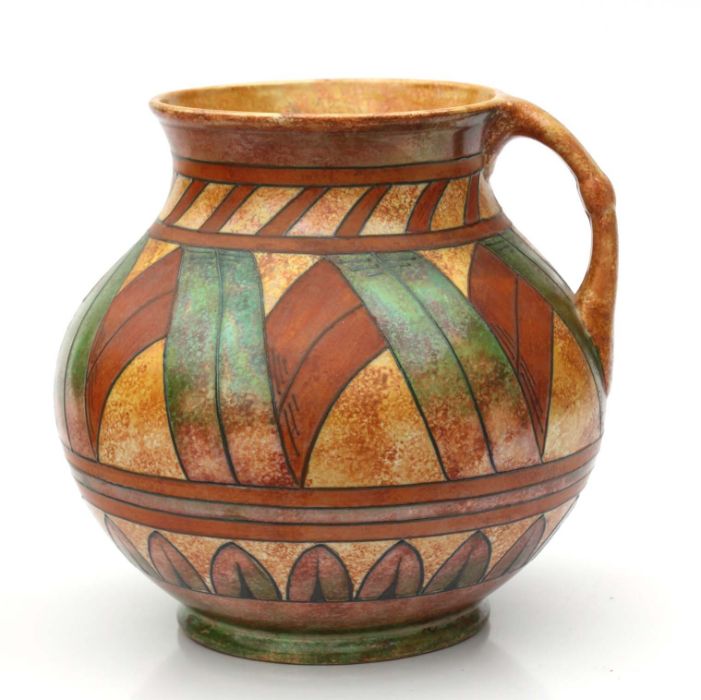 A large Burleigh ware Charlotte Rhead design jug, 20cms high.