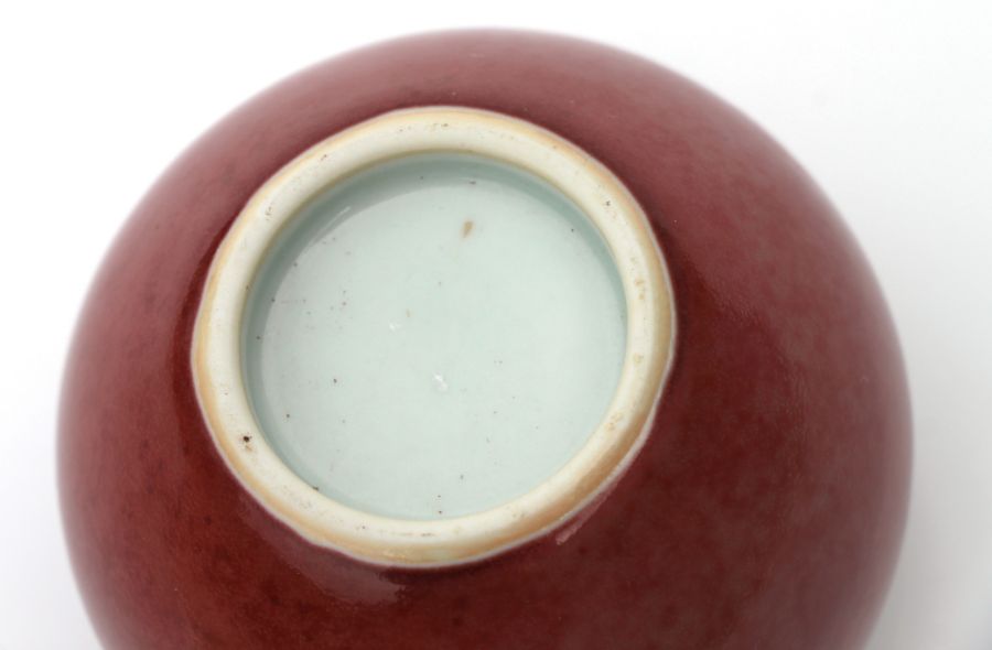 A Chinese red glazed brush washer of compressed globular form, 6cms high.Condition ReportVery - Image 2 of 10