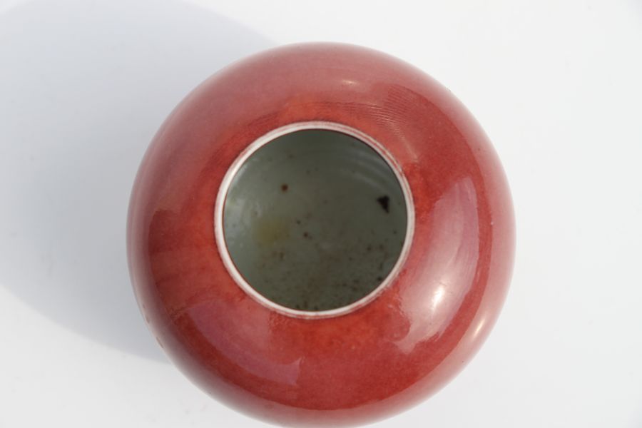 A Chinese red glazed brush washer of compressed globular form, 6cms high.Condition ReportVery - Image 9 of 10