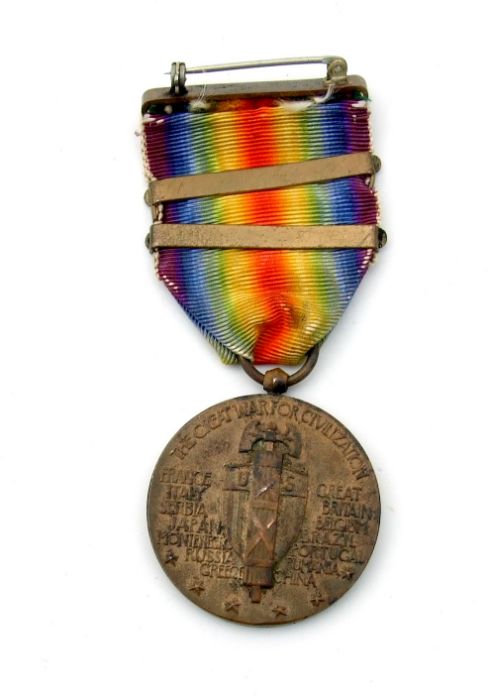 A WWI USA Victory Medal with Defensive Sector & St Mihiel clasps awarded to Raymond L Harris with - Image 2 of 3