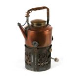 A 1920's / early 1930's copper spirit kettle on stand, 24cms high.