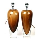 A matched pair of mid century cased smoky bubble Art glass lamps, each approx 40cms high (2).