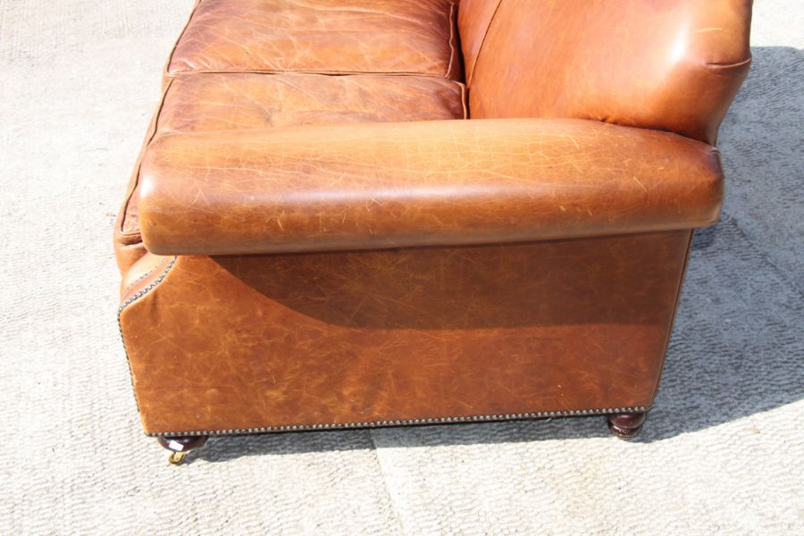 A contemporary moustache back two-seater leather sofa, approx 145cms wide.Condition ReportThere is a - Image 3 of 5