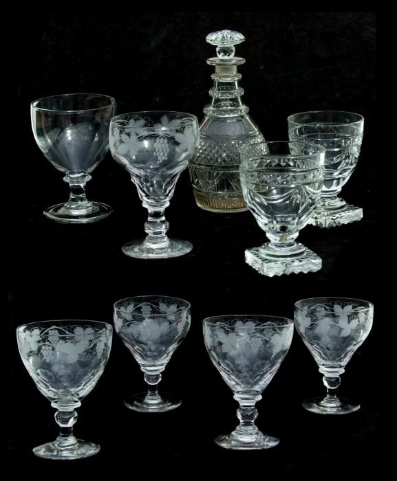 A set of four rummers with knopped stems and grape and vine engraved decoration; together with