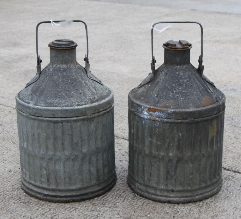 Two 1930's Regent Oil Company Ltd five-gallon galvanised petrol cans with carrying handles and screw