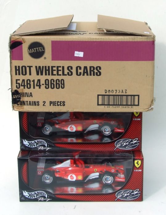 Two Hot Wheels 1:18 scale new old stock Michael Schumacher five times world champion limited edition