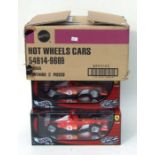 Two Hot Wheels 1:18 scale new old stock Michael Schumacher five times world champion limited edition