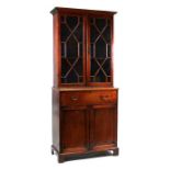 A 91th century mahogany secretaire bookcase, the astragal glazed upper section with shelved interior