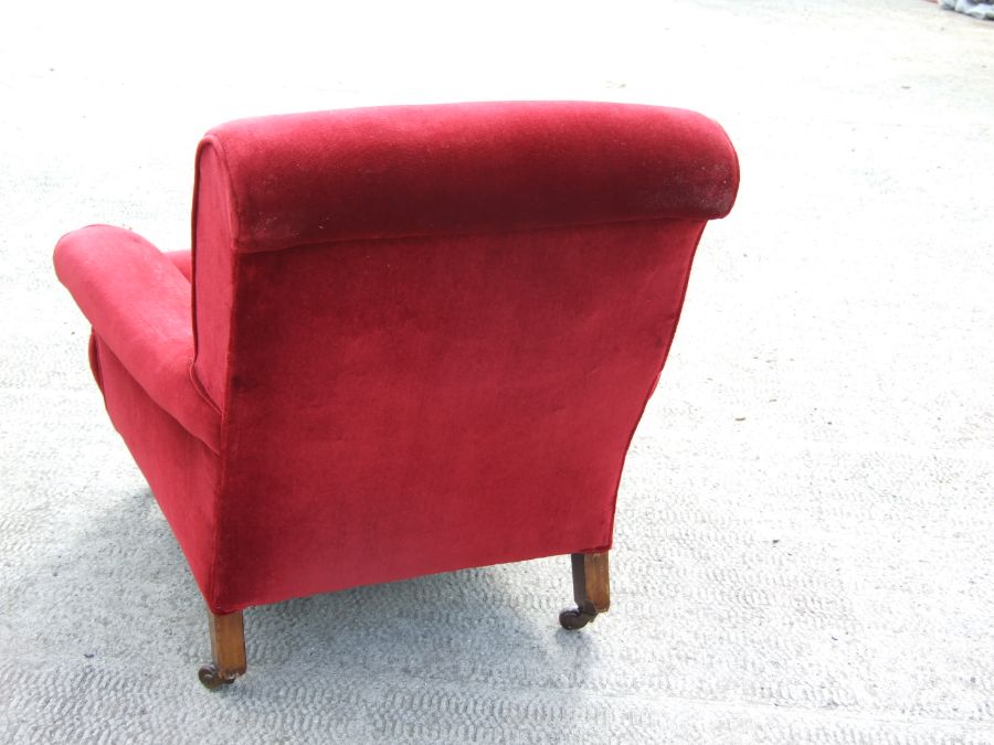 A Victorian red upholstered armchair on turned front supports.Condition Reportgood overall condition - Image 4 of 4