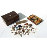 A quantity of costume jewellery in a rosewood jewellery box.