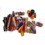 A large quantity of military medal ribbons and bars