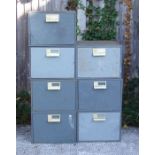 A mid century industrial 7-section metal filing cabinet unit, each section 37cms wide; and a