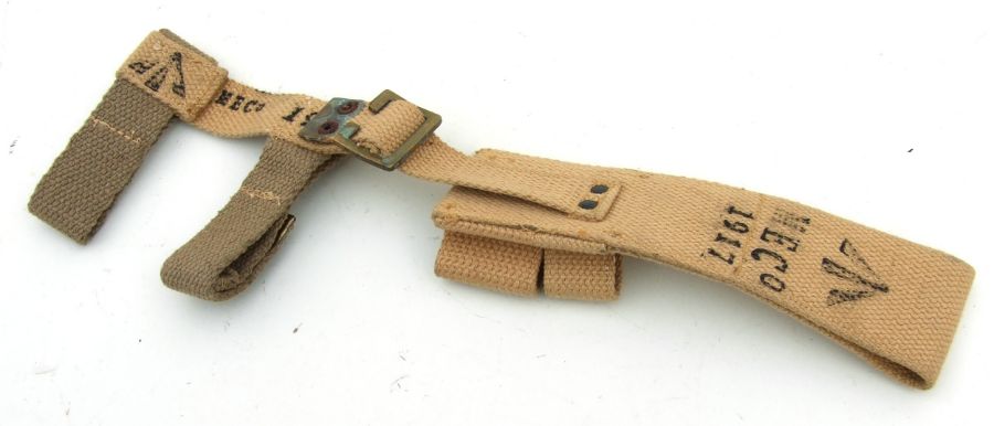 An unissued 08 Pattern bayonet frog with helve strap and carrier. Marked to the reverse of the