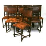 A set of eight French Henri II dining chairs with leather upholstered seats and backs (8).