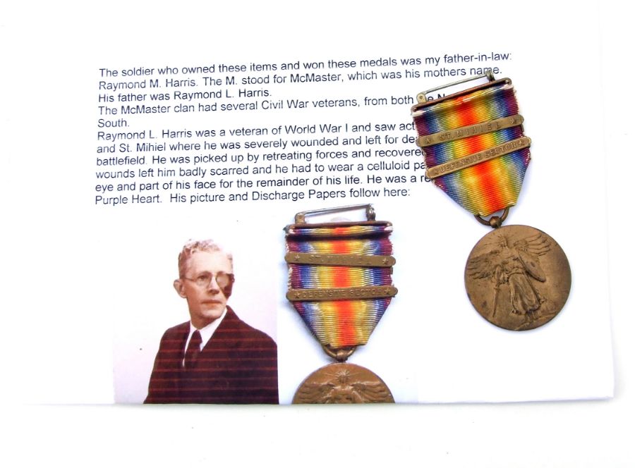 A WWI USA Victory Medal with Defensive Sector & St Mihiel clasps awarded to Raymond L Harris with