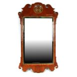 A 19th century walnut wall mirror with bevelled edge plate. overall 59cm by 104cm