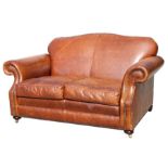 A contemporary moustache back two-seater leather sofa, approx 145cms wide.Condition ReportThere is a