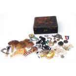 A quantity of costume jewellery in a Japanese lacquer jewellery box.