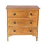 An Edwardian walnut chest of three long drawers, on square legs, 76cms wide.